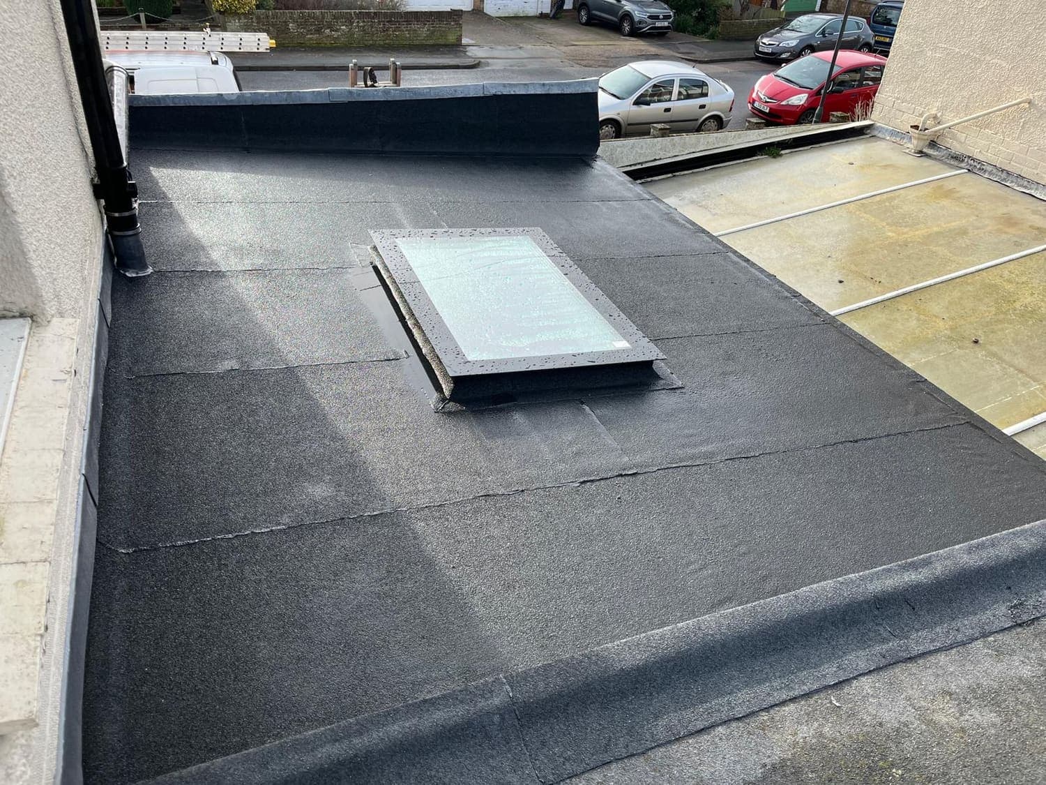 Finished flat roof with a large rooflight