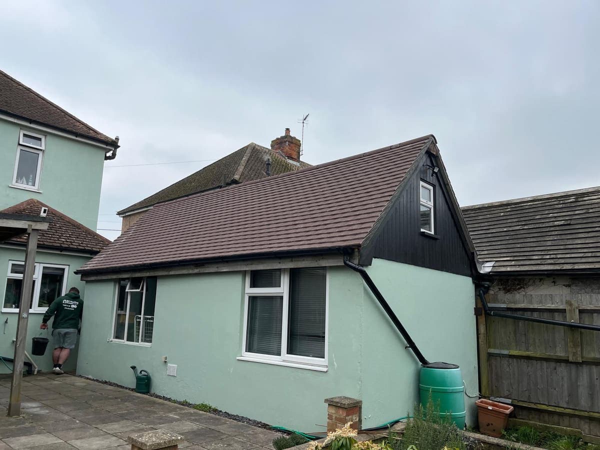 Completed single-storey extension with new tiled roof